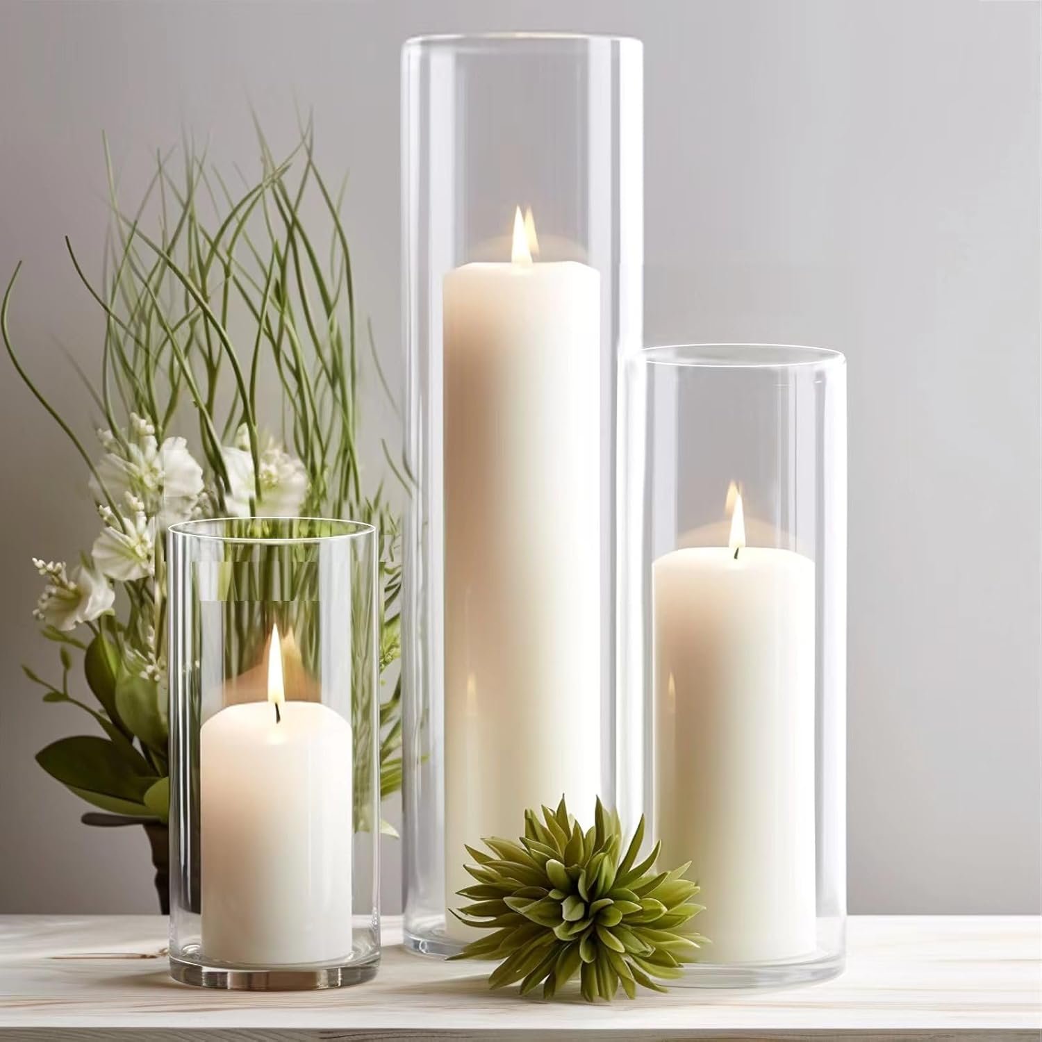 Sandraheer 24 White Pillar Candles and Clear Hurricane Glass Candle Holders | 12 Dripless Unscented Long Burn Candles and 12 Clear Glass Cylinder Vases 3 Sizes Ideal for Weddings Home and Party Decor